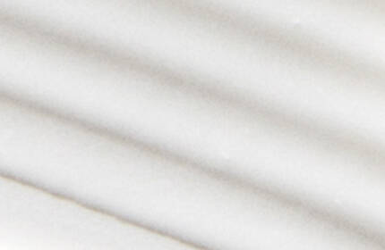 Abstract image featuring smooth, flowing white lines on a light background, creating a sense of movement and fluidity.