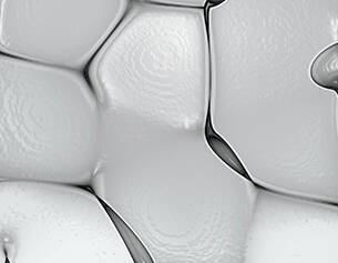 Textura de superficies lisas y tridimensionales en tonos blancos, con formas irregulares que crean un efecto abstracto.