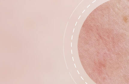 A soft, textured background in muted pink tones featuring a circular element with a subtle pattern, surrounded by dashed lines.