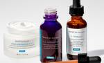 Productos de cuidado facial de SkinCeuticals: crema restauradora, suero intensificador de H.A. y suero C E Ferulic.