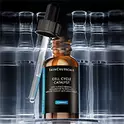 Un frasco de Phyto Corrective Gel de SkinCeuticals, de color verde claro.