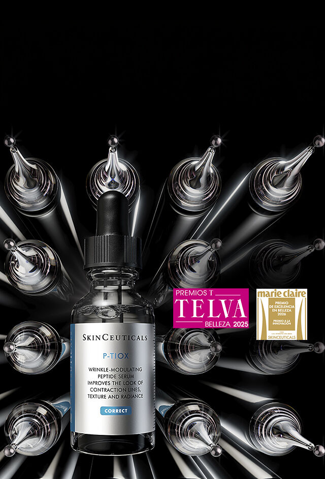 Frascos de sueros de Skinceuticals, Silimarina CF y E Ferulic, sobre un fondo oscuro.